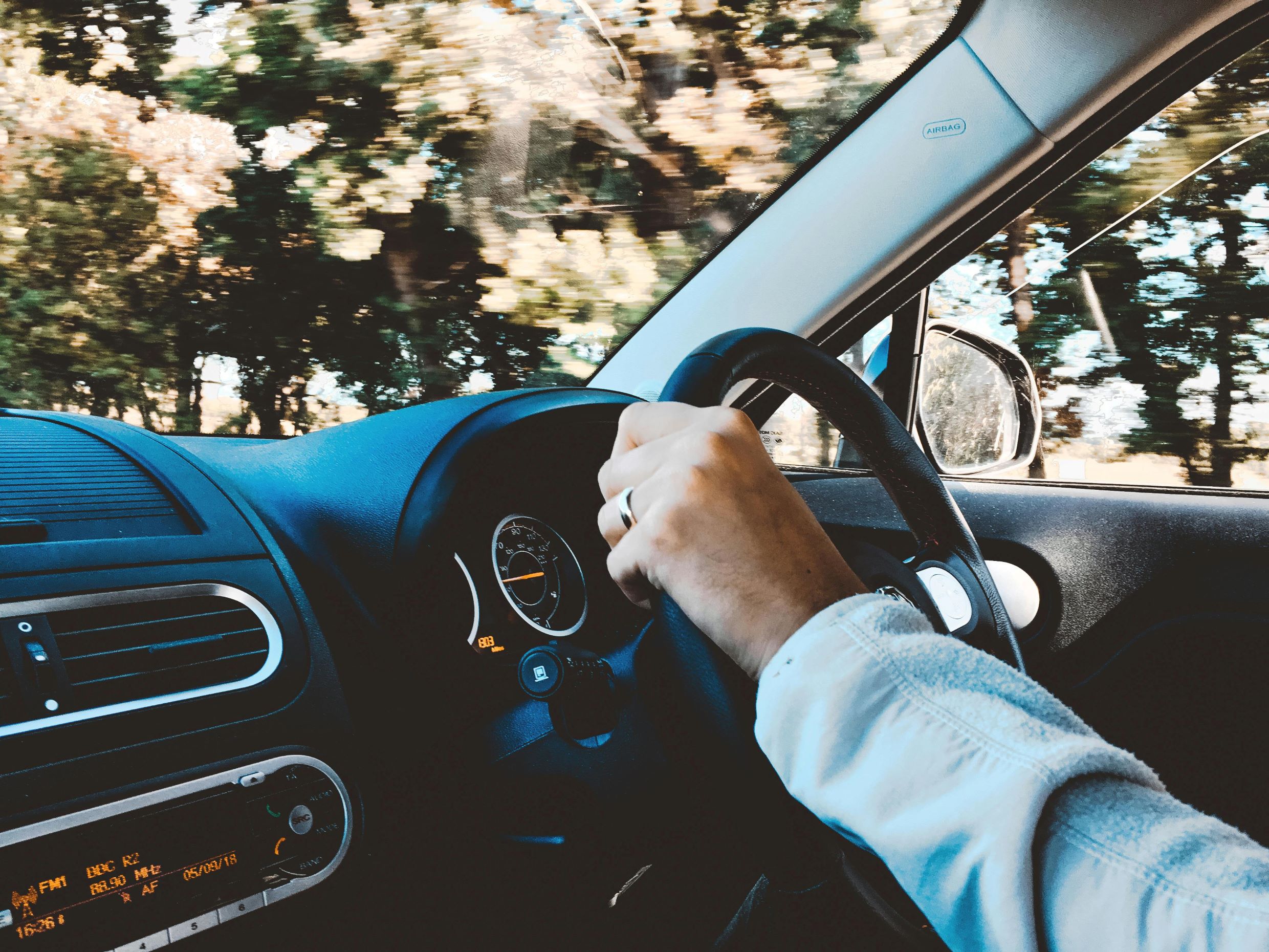 man from the military driving in his car